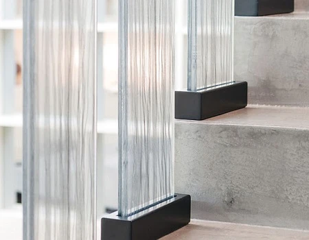 Fabric laminated glass